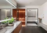 In total, the estate has nine bathrooms. This one has a spacious sauna and a rain shower.
