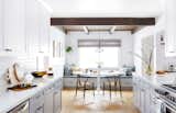 The wooden ceiling above the dining nook is one of the few remaining features from the home's midcentury past.