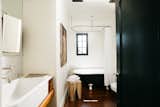 The guest bath has a clawfoot tub.