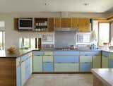 "Also consider performance when purchasing an older house, as these properties use a ton of energy,” says Schaer. “Many midcentury homes are minimally insulated and can be costly and challenging to remedy. For example, if you want to add insulation to a roof, you have to add it above the roof because there is no cavity for insulation."