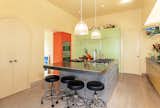 A look at the Miele double-oven, Dacor exhaust fans, fridge and cabinetry with Abet Laminati finish in the kitchen.

