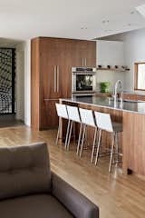 “Sometimes this means considering what is hidden away as much as what’s visible,” he adds. “With counter space at a premium, valuable space can be saved by designating an enclosed area to tuck away those space-sucking counter-top appliances and gadgets.”