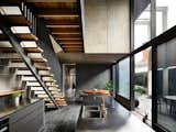 Double-height glass now lets the communal living areas spill out onto an exterior courtyard.