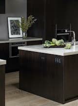 For this Seattle, Washington, home designer Charlie Hellstern selected concrete countertops. "Inherently durable, made sustainably, and it fit with the modern aesthetic of the home," she says. 