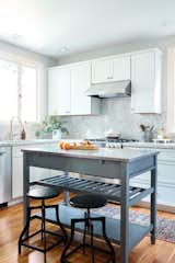 Clara kept the kitchen, which had been freshly remodeled prior to her moving in, appreciating the high-quality fixtures. 